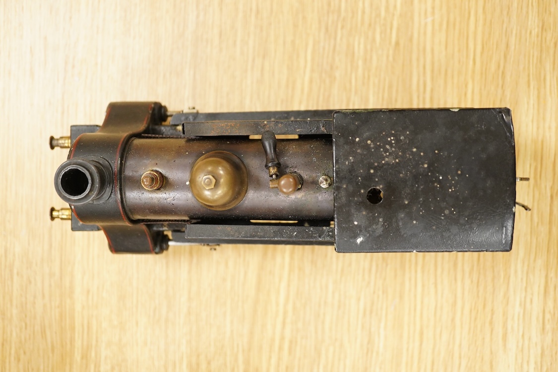 An early 20th century Gauge One Bing live steam 0-4-0T ‘I48’ locomotive, with a spirit fired pot boiler, driving a single oscillating vertical cylinder mounted in the cab, with twin outside dummy cylinders, the regulator